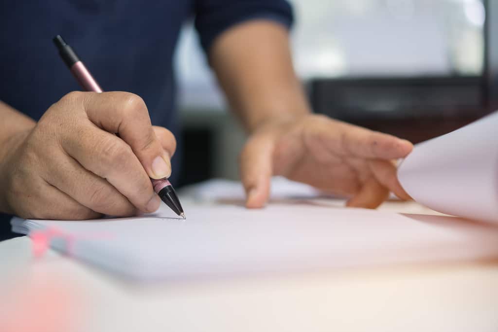 Businessman Executive Signing On Official Document Paperwork Fil