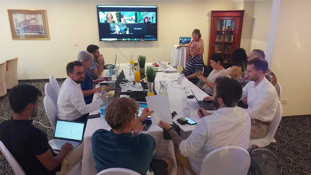 CS Track project meeting CS Track project meeting, team members sitting around the table in the conference room
